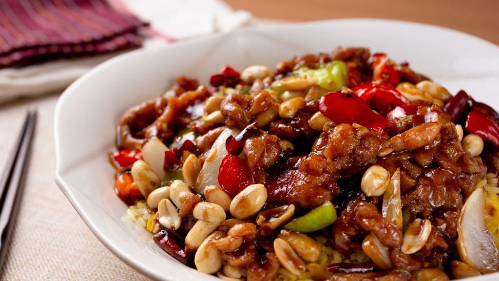 Kung Pao Beef · Hot and spicy. Deep fried beef prepared with garlic, onions and chili pepper sauce.