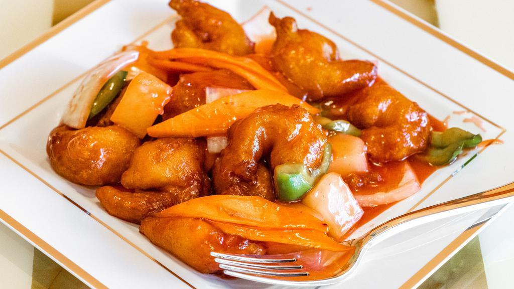 Sweet & Sour Shrimp · Prepared with pineapple, bell peppers, onions and carrots.