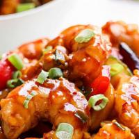 Kung Pao Shrimp · Hot and spicy. Prepared with red chili peppers, onions and peanuts.
