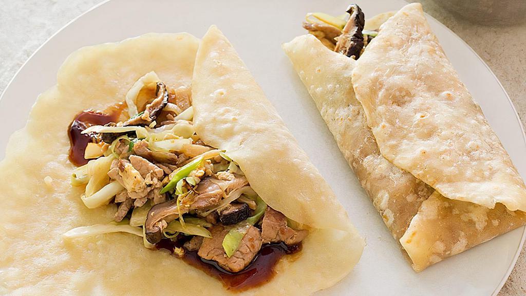Mu Shu Pork · Prepared with cabbage, egg, bamboo shoots and rolled into Chinese crepes.