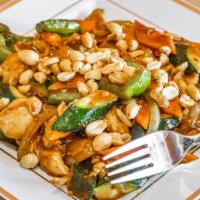 Kung Pao Chicken · Hot and spicy. Prepared with red chili peppers, onions and peanuts.