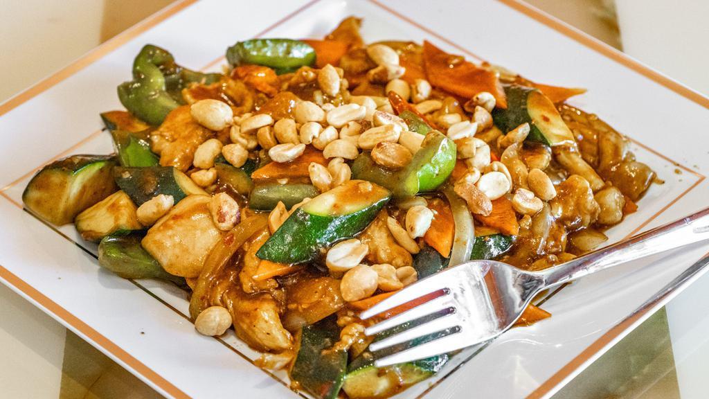 Kung Pao Chicken · Hot and spicy. Prepared with red chili peppers, onions and peanuts.