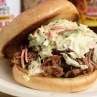 Large Carolina Pulled Pork · Pulled pork, sauce, and topped with cole slaw.