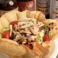 Ranch House Salad With Meat · In a fresh tortilla shell with choice of meat (add  beef for additional charge), bacon, chee...