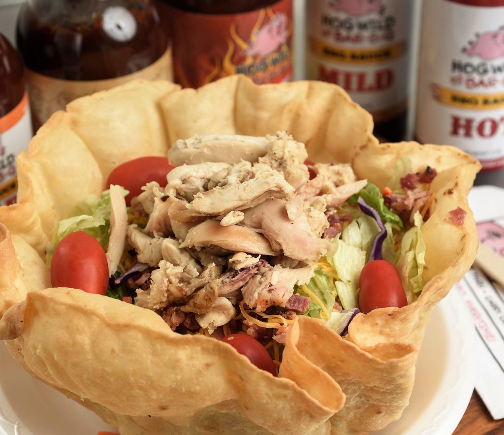 Ranch House Salad With Meat · In a fresh tortilla shell with choice of meat (add  beef for additional charge), bacon, cheese, tomato, and your choice of dressing.