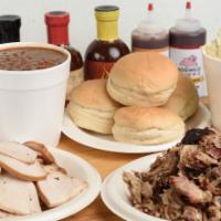 #2 Family Pack (Feeds 8) · 2 lbs. of meat, 2 quarts of sides, 8 buns, and sauce.