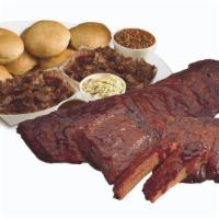 Tailgate Pack · 2 slabs of ribs, 2 lbs. of meat, 3 quarts of sides, 8 buns, 12 cookies, and sauce.