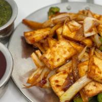 Paneer Chilli · Paneer cooked to perfection with curry sauce and veggies.