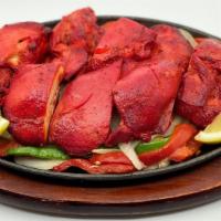 Chicken Tika Kabab · Boneless chunks of chicken, marinated overnight and cooked in the clay oven.