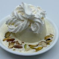 Kulfi · Indian ice cream with almonds and pistachios.