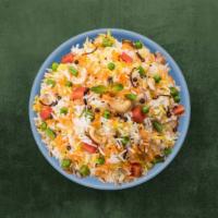 Veggie Biryani · Basmati rice cooked with vegetables and fresh herbs, spices and cooked in a special home-mad...