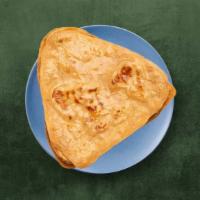 Plain Paratha · A whole wheat flat bread, baked on a pan