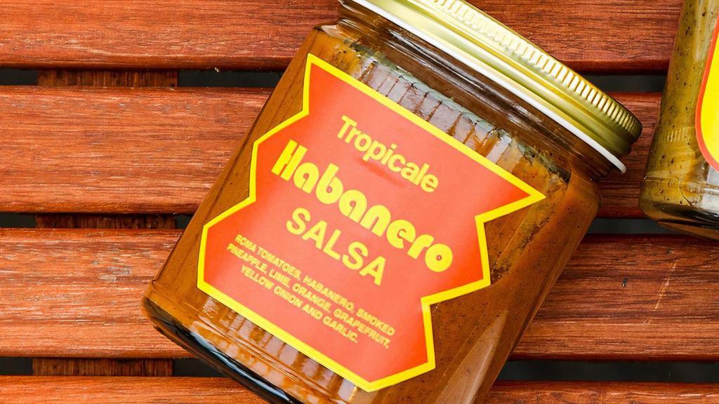 Tropicale Habanero Salsa · Our house made salsa, bottled at 9 ounces. Roma tomatoes, habanero, smoked pineapple, lime, orange, grapefruit, yellow onion and garlic.