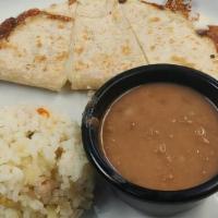 Kids Quesadilla · Flour tortilla, cheese, rice and beans or French fries.