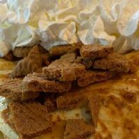 Biscoff Crepe · Bananas and biscoff cookie spread topped with crushed biscoff cookies, whipped cream, powder...