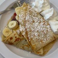 French Toast Crepe · We crack an egg on a crepe while it cools on the crepe grill. Flip it. Season with cinnamon,...