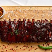 Pork Ribs  · The best piece of pork ribs seasoned with our homemade barbecue sauce. Unmissable!