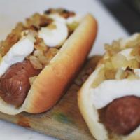 Seattle Dog · A gourmet hot dog served with grilled onions and cream cheese.