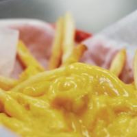 Cheese Fries · Our famous fries covered in melted cheddar cheese.