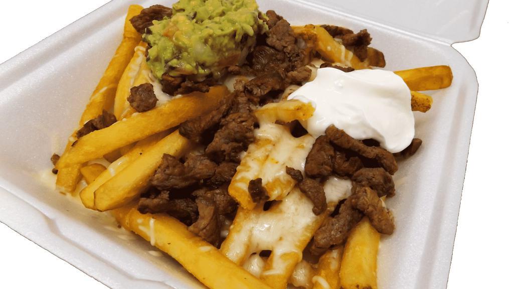 Asada Fries Plate · Fries served with melted cheese, sour cream and guacamole.