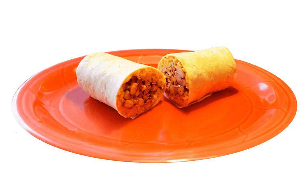 Kid'S Burrito · Flour tortilla burrito served with rice, beans, melted cheese and your choice of meat.