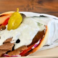 Traditional Gyro · Beef & Lamb or Chicken Breast . Tomatoes - Red Onions - Tzatziki