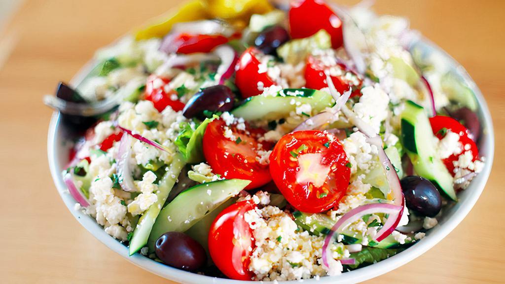 Small Classic Greek Salad · Romaine Lettuce - Tomatoes - Cucumbers - Red onion - Feta - Kalamata Olives - Pita Bread - Housemade Greek Vinaigreete