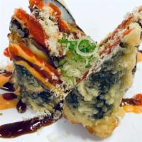 Volcano Roll · Fried Tuna, Cucumber, Crab Stick, Spicy Mayo, Sriracha, Eel Sauce