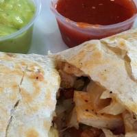 Super Burrito · Our regular burrito plus sour cream, cheese & avocado.