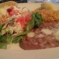 Taco Plate · Two tacos with your choice of meat or veggie, topped with cilantro and onions. Side of rice ...