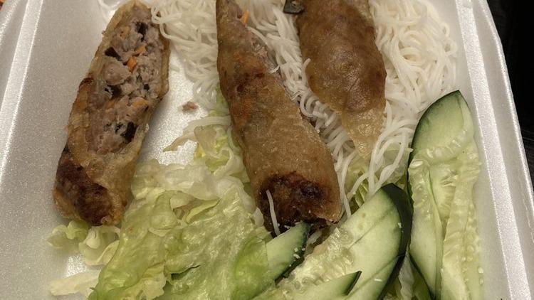 Vietnamese Egg Roll · Pork sausage egg roll on a bed of steam rice noodle with chili Lime Sauce.