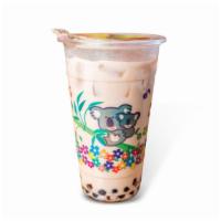 Thai Milk Tea · Thai milk tea served with black tapioca pearls sweetened with agave nectar over ice.