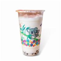 Taro · Taro milk tea served with black tapioca pearls sweetened with agave nectar over ice.