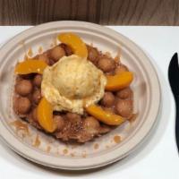 Ultimate Waffle · Peach, mango with granola & almond. Fruit: peach. Topping: caramel syrup & sugar.