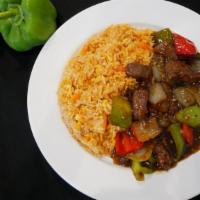 Stir-Fried Black Pepper Beef Cube With Fried Rice In Tomato Sauce · It's spicy.
黑椒牛柳粒配番茄炒飯 - 微辣