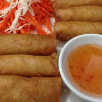 Spring Roll · Mixed vegetables enveloped in spring roll wrappers and deep-fried to a golden brown. Served ...
