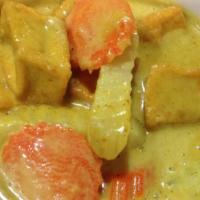 Yellow Curry · Choice of protein cooked with yellow curry paste, coconut milk, carrots, onions and potatoes...