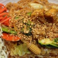 Vegetarian Pad Thai · Stir-fried rice noodles (MENTION IF EGG or NO EGG), tofu, green onions, bean sprouts and mix...