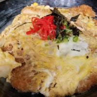 Katsu-Don · Pork cutlet and egg in soy broth rice bowl.