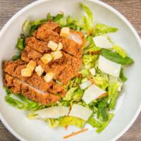 Chicken Caesar Salad · Romaine, Breaded chicken breast, croutons, parmesan cheese, Caesar dressing