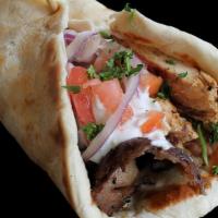 Meat Combo Pita (Halal) · Chicken shawarma and gyros on a pita with hummus, lettuce, onions, tomatoes, and tzatziki sa...