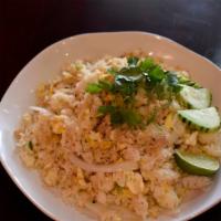 F2 Crab Fried Rice · Stir fried rice with crab meat, onions and eggs.