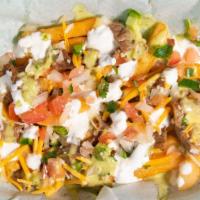 Carne Fries · Seasoned Fries Topped With Carne Asada Meat, Pico, Salsa Guac, Sour Cream, Cheddar Cheese, C...