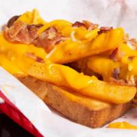 Fri Dog · Buttered Brioche Bun With Premium All Beef Nathans HotDog Wrapped In Center Cut Bacon, Fries...