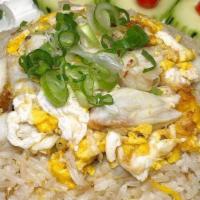Crab Fried Rice · Jumbo lump crab meat, rice, onions, eggs, and scallions.