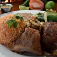 Carnitas · Tender pieces of pork slow cooked in it`s own juices, pickled onion. Served with pico de gal...