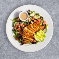 Crispy Cult Salad · Our signature crispy fried chicken sliced and served over fresh greens, with tomato, onion, ...