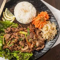 Beef Bulgogi · Includes rice and two sides.