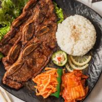 Kalbi · Includes rice and two sides.