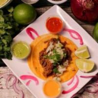Street Taco · Birria, cilantro, onion and lime.